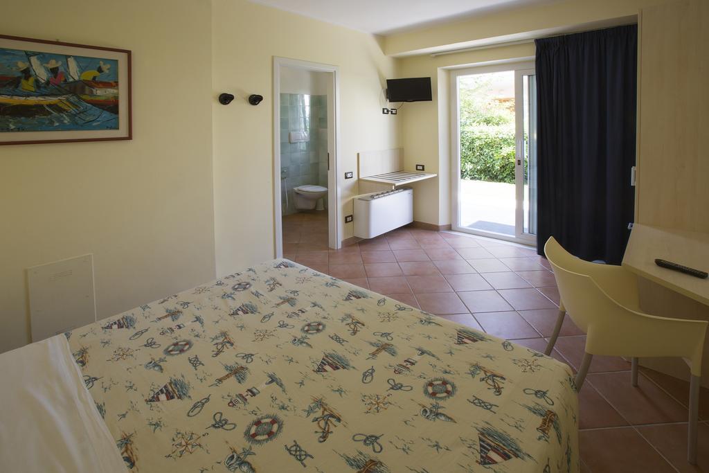 Hotel Vila Bahia Numana Quarto foto